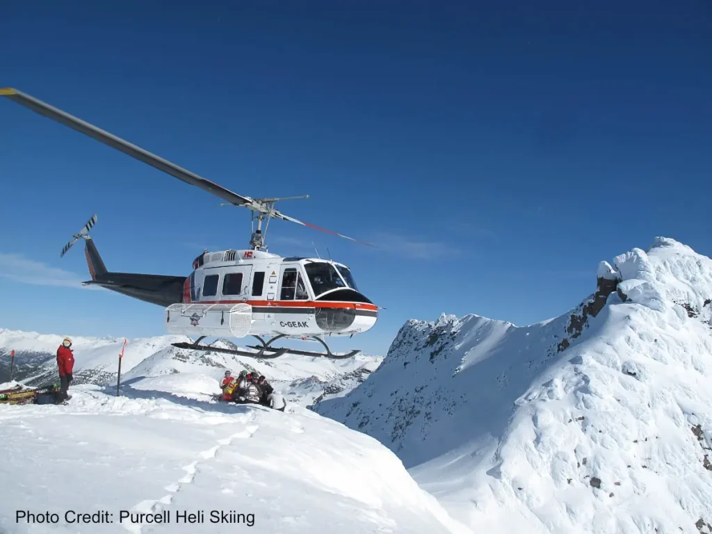 helicopter dropping off heli skiers near Kicking Horse resort