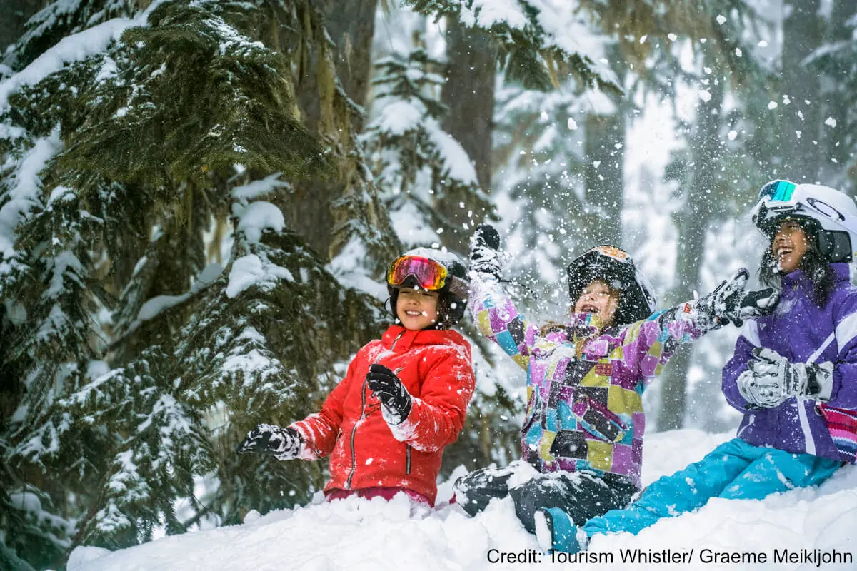 kids playing in the snow in Whistler