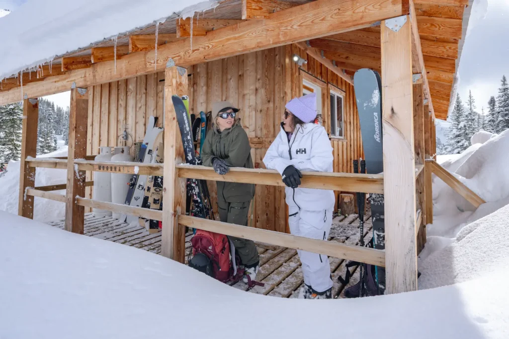 skiers standing outside a lodge at Whitecap Adventures