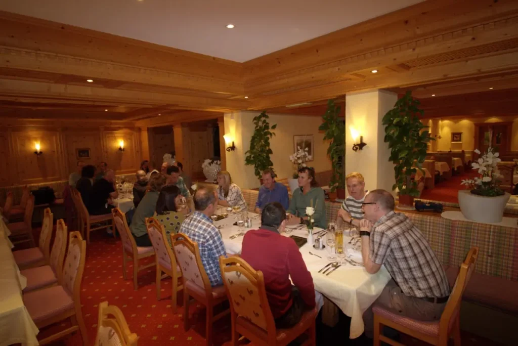 Canadian Ski Vacations group sitting down to dinner