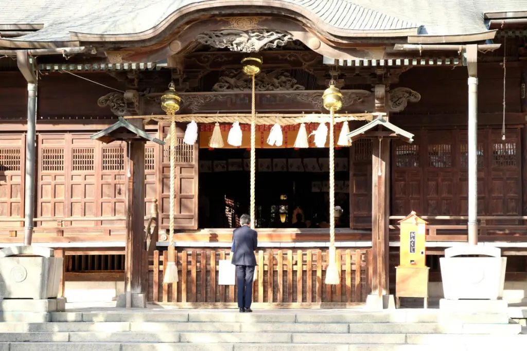 man near temple in Tokyo
