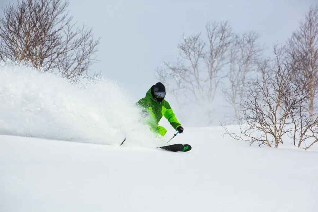 skier carving turns in Niseko