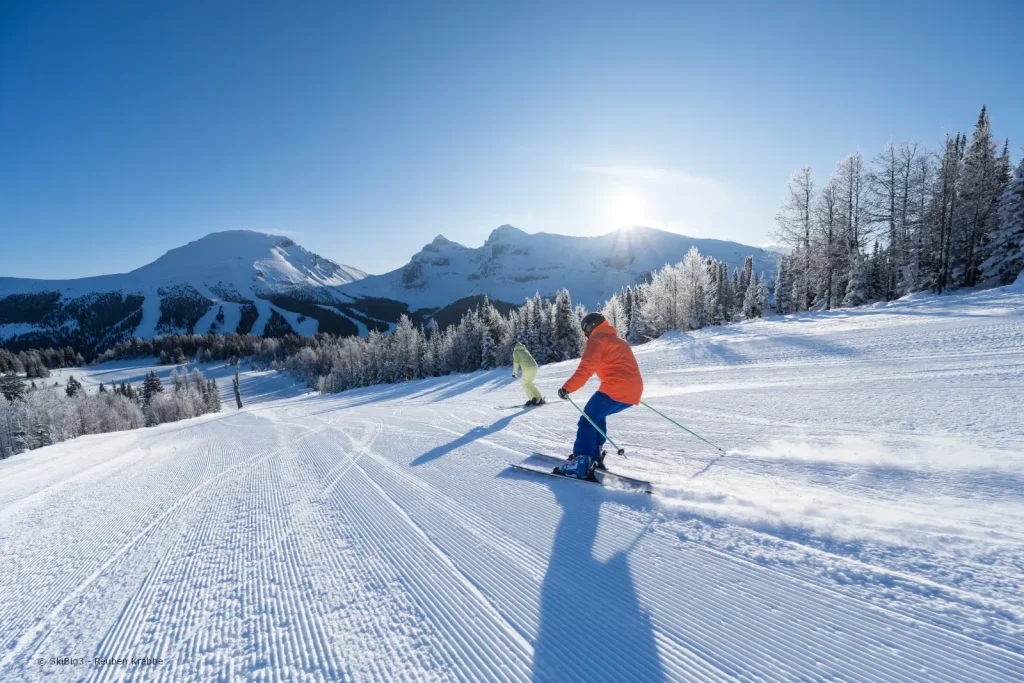 Skiers descending at Sunshine Village in Banff